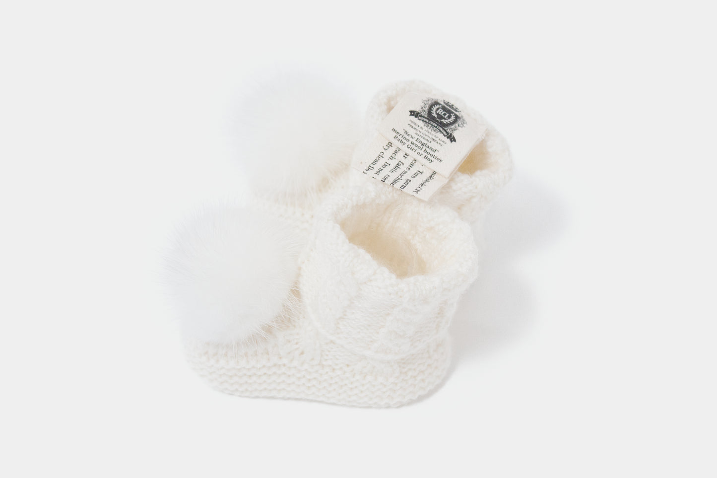 7.3 “New England” merino wool booties (White PomPoms)